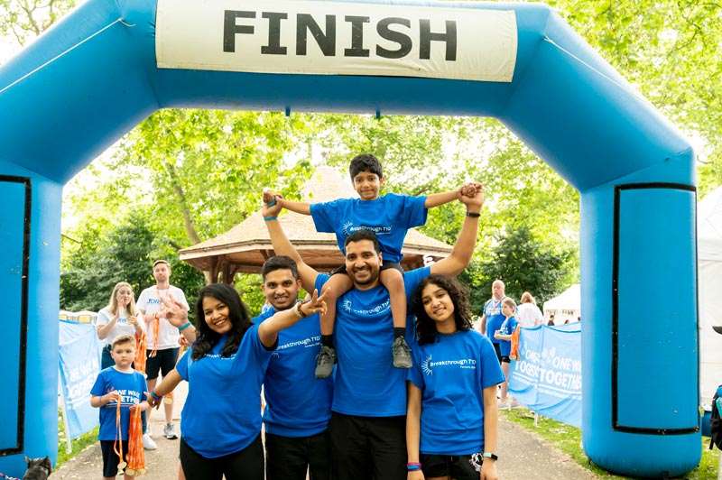 Family with children at finish line of One Walk fundraising event for type 1 diabetes