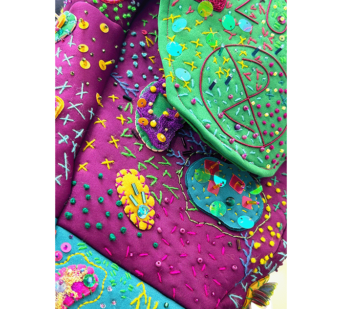 A close up of detailed embroidery work on Megan Neville's Day Bag for her project, Ordinary Oddness.