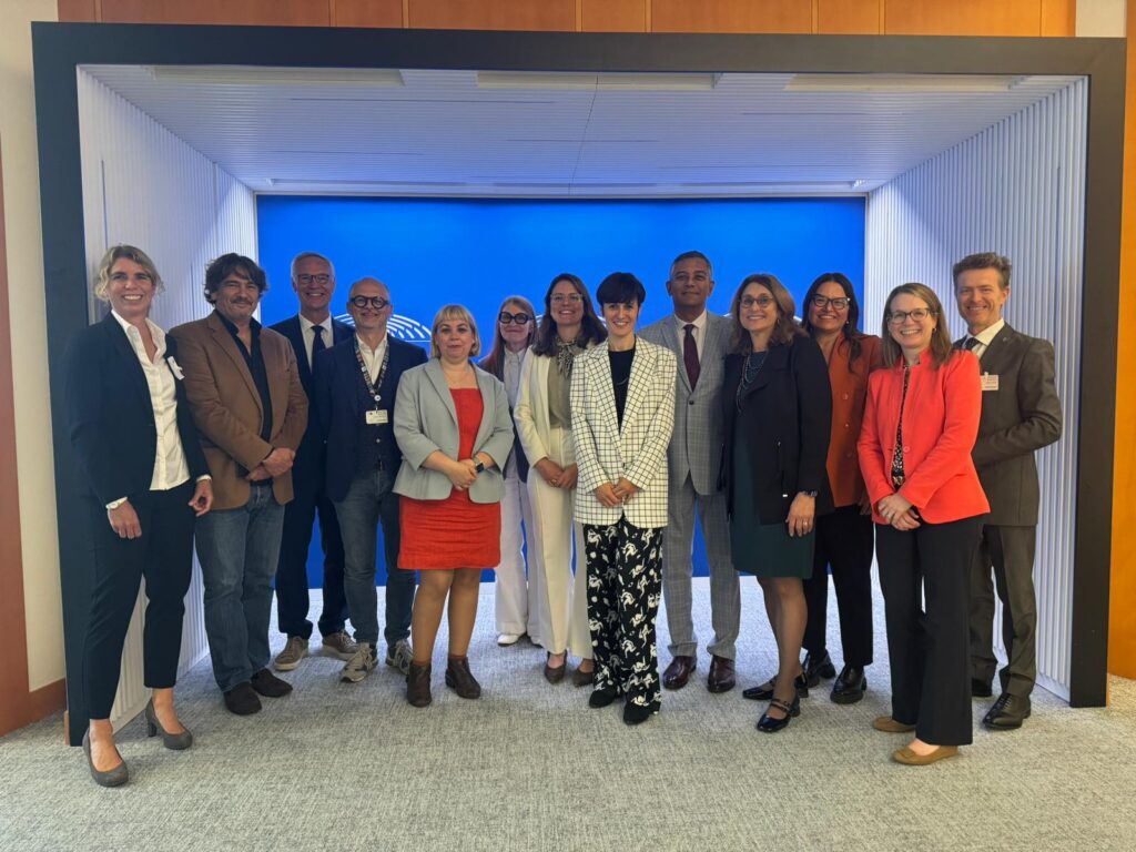 MEPs and Breakthrough T1D staff posing for a photograph at the European Parliament