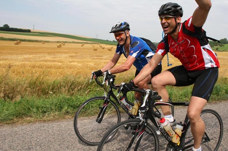 Cyclists on country road in London to Paris Cycle ride event.