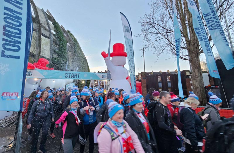 Walkers wearing warm clothes at the Ultra Challenge London Winter Walk start line