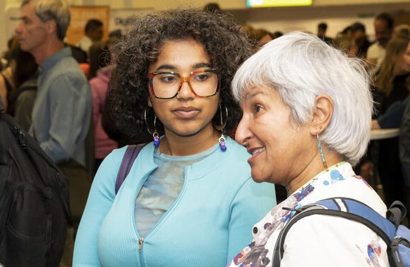 Two women at busy Breakthrough T1D Discovery Day event